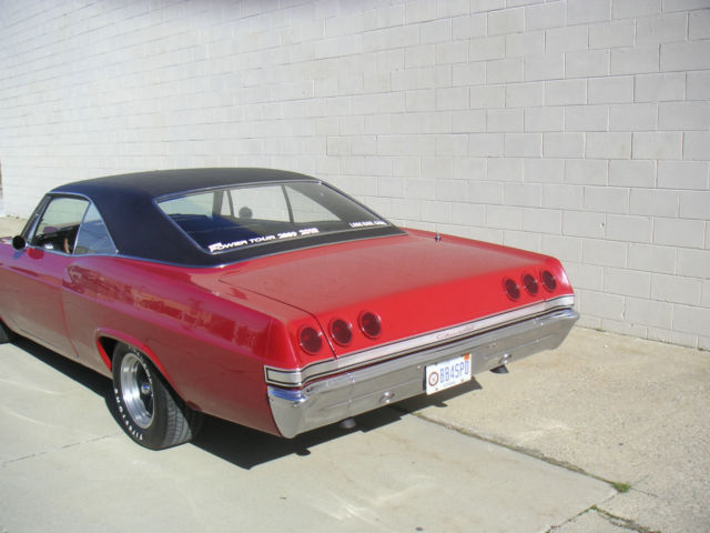 1965 Red Chevrolet Impala 2 door hard top