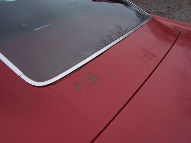 1965 Red Chevrolet Impala cou