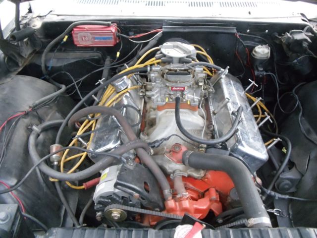 1965 white Chevrolet Impala Coupe