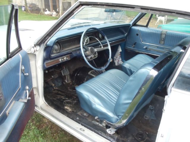 1965 white Chevrolet Impala Coupe