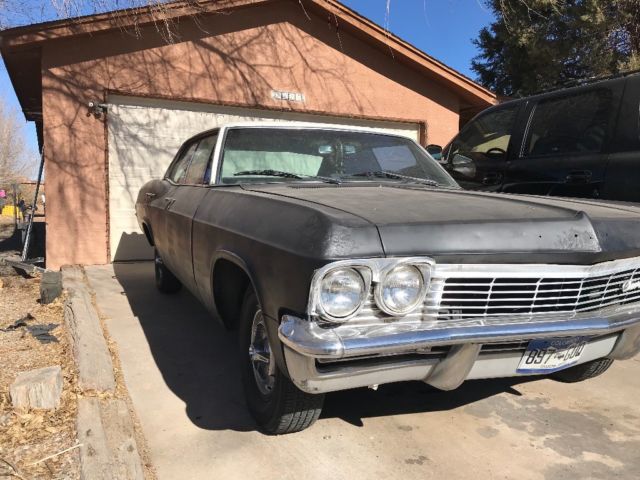 1965 Black Chevrolet Capriceold
