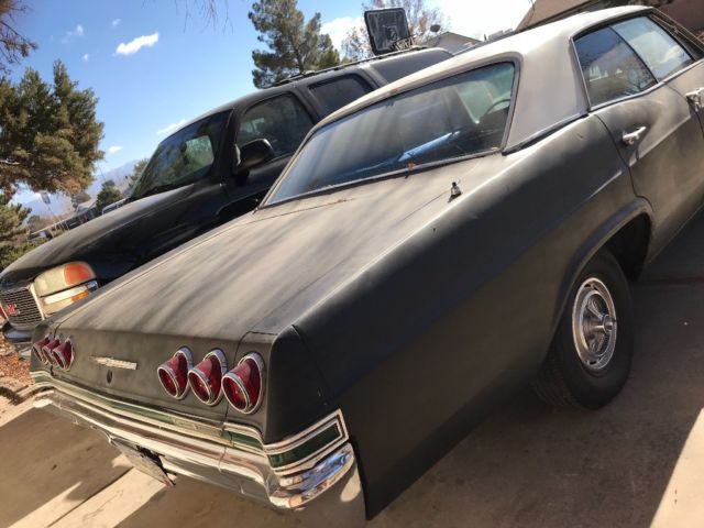 1965 Black Chevrolet Capriceold