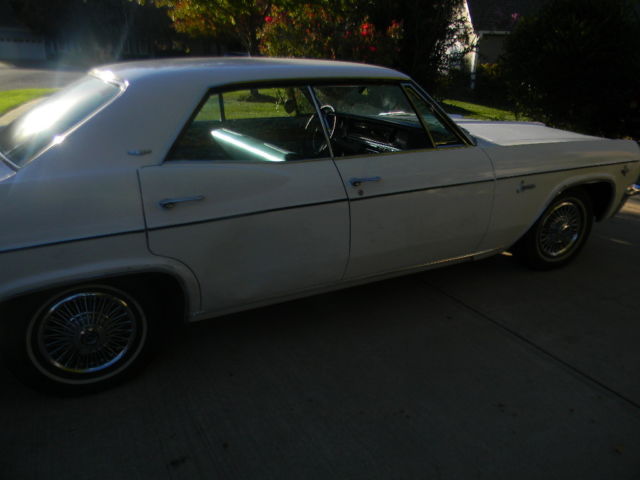 1965 White Chevrolet Capriceold 4 door
