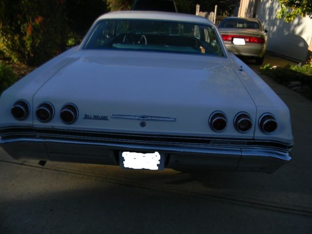 1965 White Chevrolet Capriceold 4 door