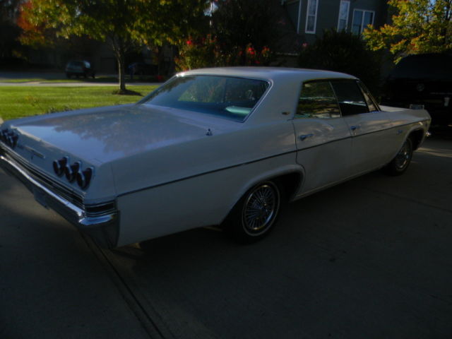 1965 White Chevrolet Capriceold 4 door