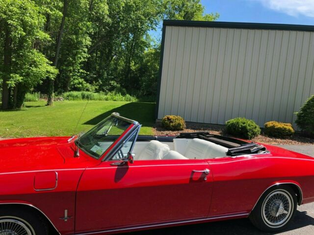 1965 Red Chevrolet Corvair Convertible