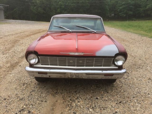 1965 maroon Chevrolet Nova Coupe
