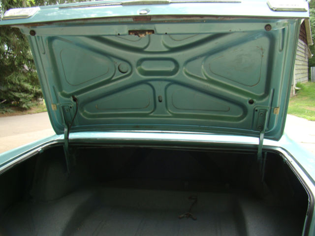 1965 Black and Turquoise Chevrolet Nova Coupe