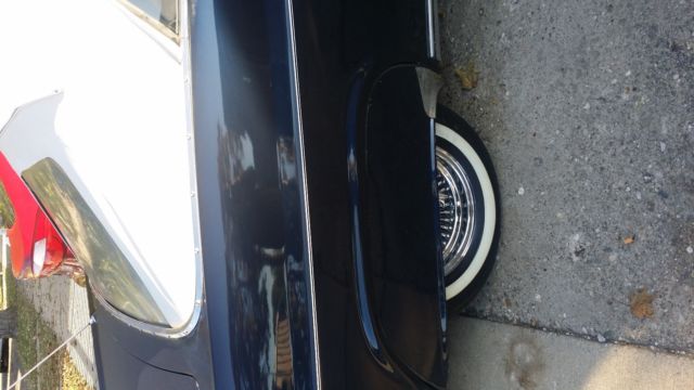 1965 Red Chevrolet Impala Convertible