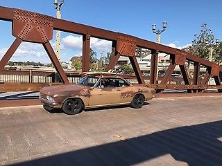 1965 Gold Chevrolet Corvair Coupe