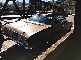 1965 Gold Chevrolet Corvair Coupe
