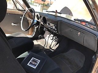 1965 Gold Chevrolet Corvair Coupe