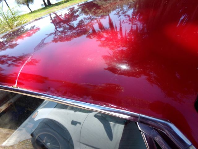 1965 Red Chevrolet Corvair Coupe