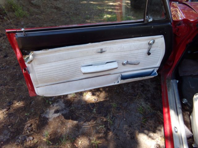 1965 Red Chevrolet Corvair Coupe
