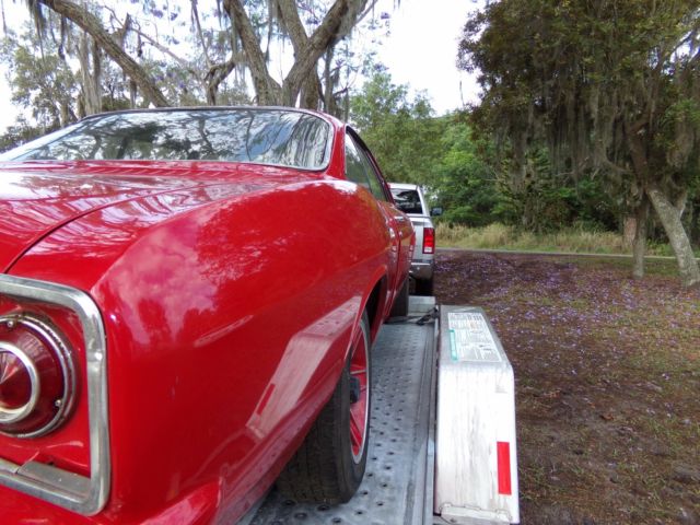 1965 Red Chevrolet Corvair Coupe