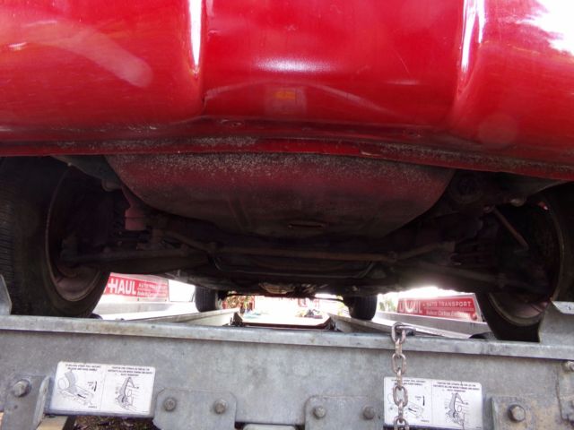 1965 Red Chevrolet Corvair Coupe