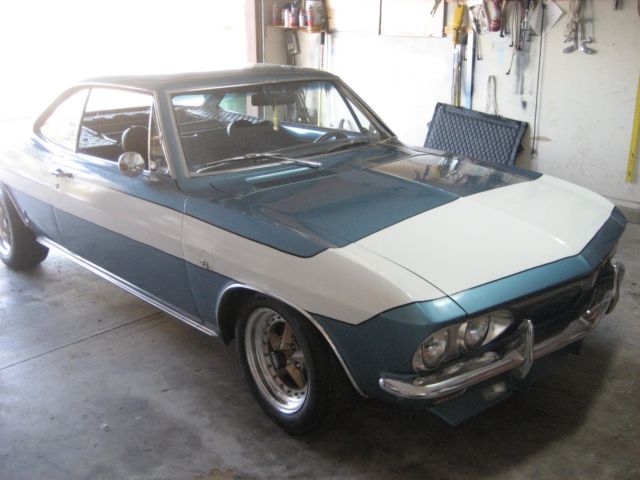 1965 blue Chevrolet Corvair 2 door