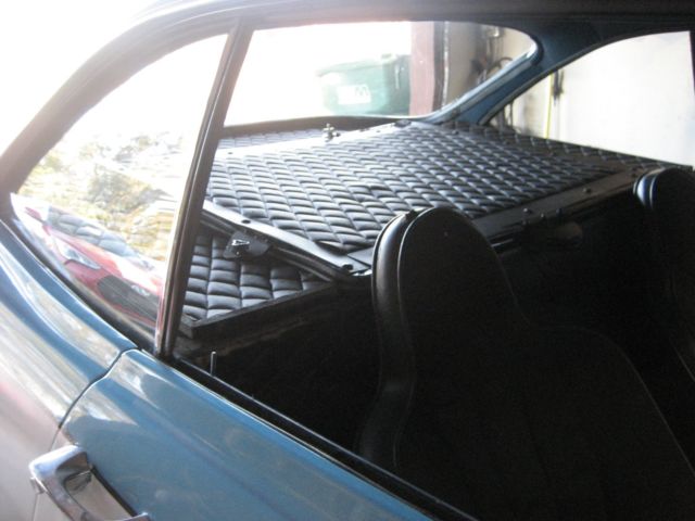 1965 blue Chevrolet Corvair 2 door