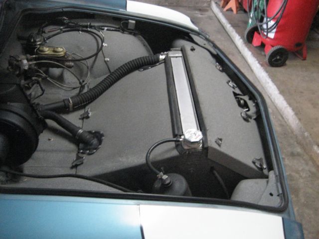 1965 blue Chevrolet Corvair 2 door