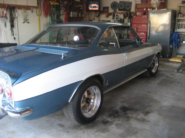1965 blue Chevrolet Corvair 2 door