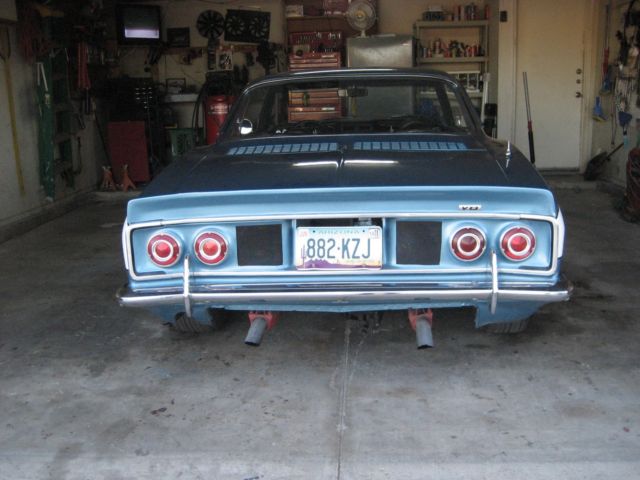 1965 blue Chevrolet Corvair 2 door