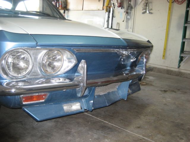 1965 blue Chevrolet Corvair 2 door