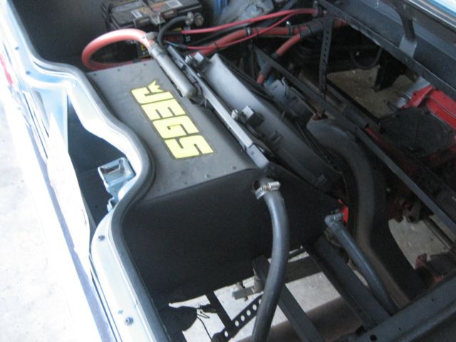 1965 blue Chevrolet Corvair 2 door