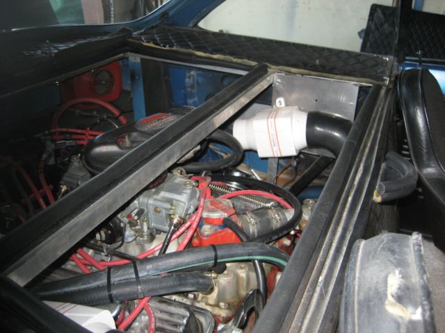 1965 blue Chevrolet Corvair 2 door