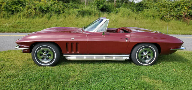 1965 maroon Chevrolet Corvette Convertible