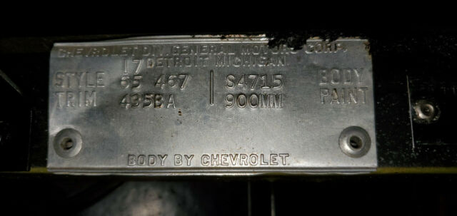 1965 maroon Chevrolet Corvette Convertible