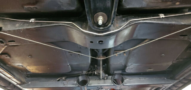 1965 maroon Chevrolet Corvette Convertible