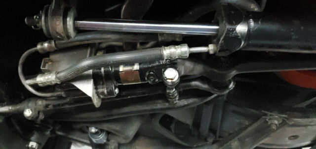 1965 maroon Chevrolet Corvette Convertible