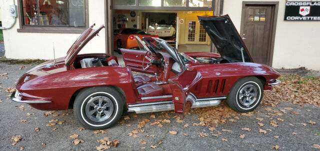 1965 maroon Chevrolet Corvette Convertible