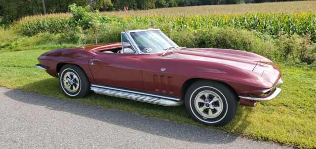 1965 maroon Chevrolet Corvette Convertible
