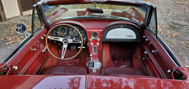 1965 maroon Chevrolet Corvette Convertible