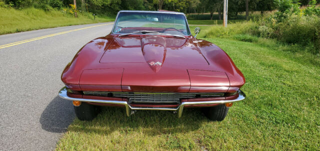 1965 maroon Chevrolet Corvette Convertible