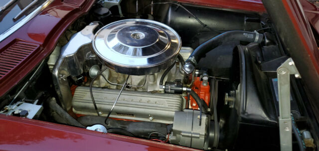 1965 maroon Chevrolet Corvette Convertible