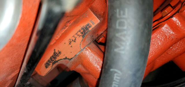 1965 maroon Chevrolet Corvette Convertible