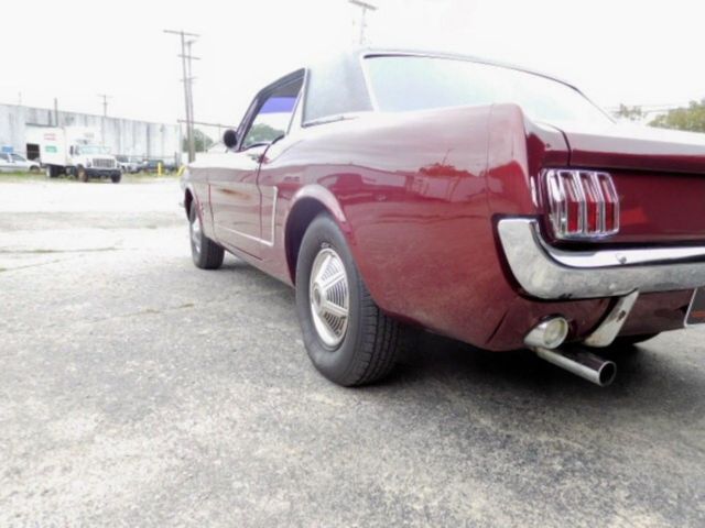 1965 Burgundy Ford Mustang Coupe