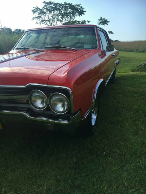 1965 Red Oldsmobile 442 Coupe