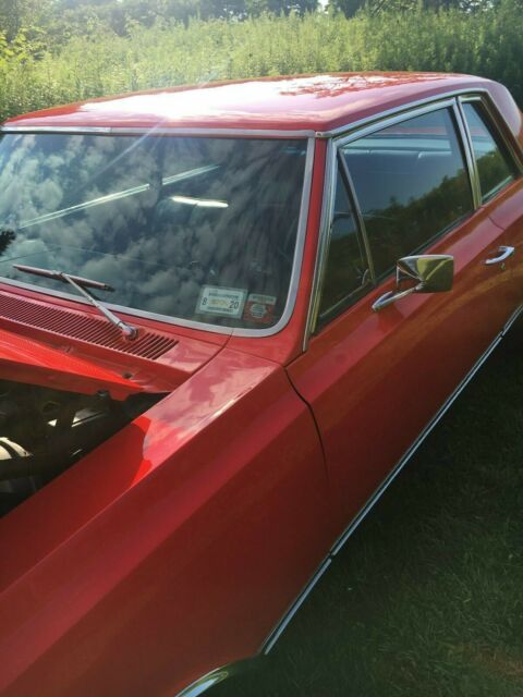 1965 Red Oldsmobile 442 Coupe