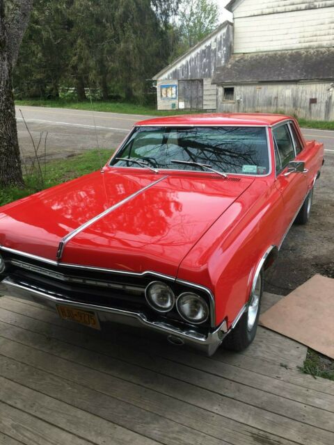 1965 Red Oldsmobile 442 Coupe