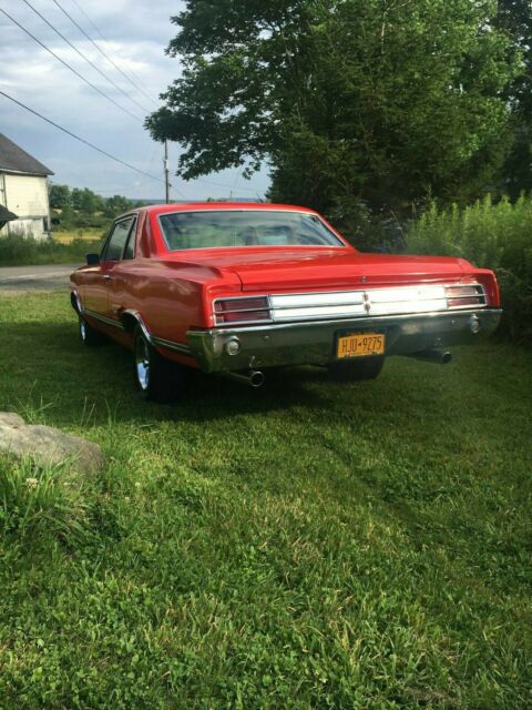 1965 Red Oldsmobile 442 Coupe