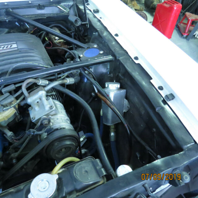 1965 White Ford Mustang Fastback