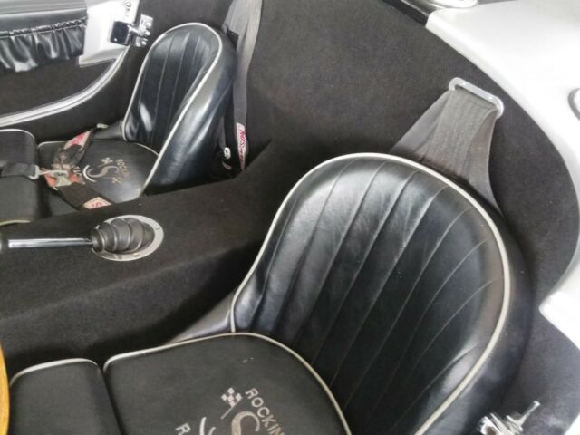 1965 Silver Ford Cobra Convertible