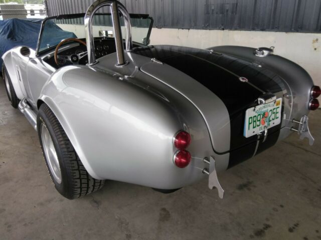 1965 Silver Ford Cobra Convertible