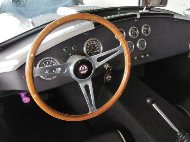 1965 Silver Ford Cobra Convertible