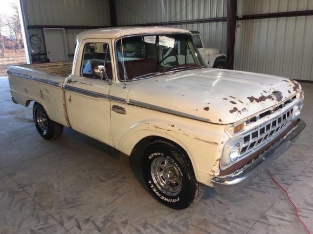 1965 White with some patina in areas. Ford F-100 Custom can short bed