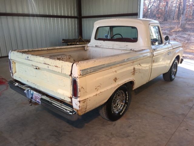 1965 White with some patina in areas. Ford F-100 Custom can short bed