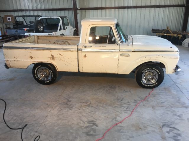 1965 White with some patina in areas. Ford F-100 Custom can short bed